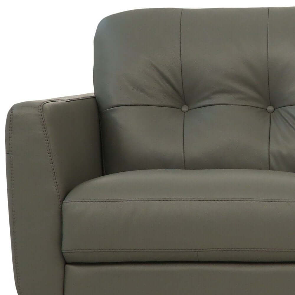 Close-up of the 83" Green Leather Sofa With Black Legs showcasing buttery soft leather and stylish tufted design.