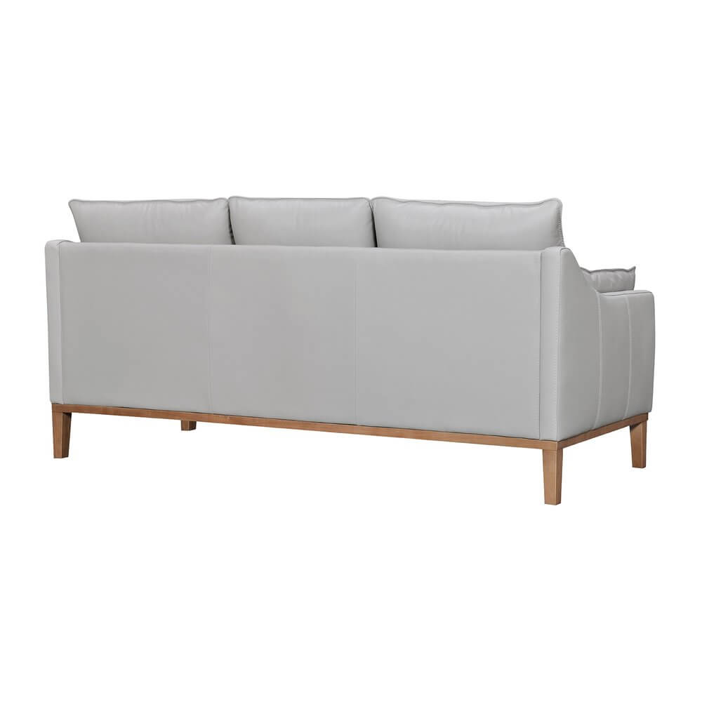 87" Gray Leather Sofa And Toss Pillows With Brown Legs from the back, showcasing its elegant design and premium leather.
