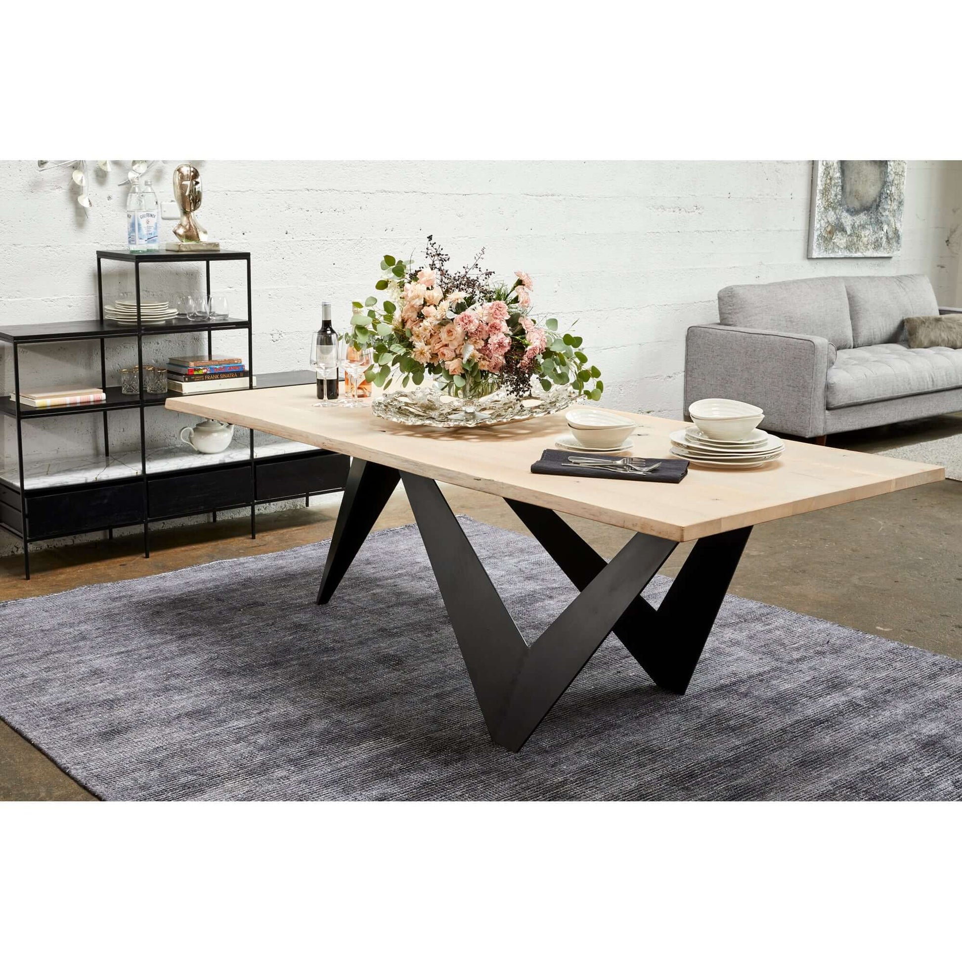 88" Bird Live Edge Oak Dining Table with Sculptural Iron Base – Seats 6 showcased in a modern dining room setting.