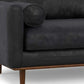 89" Black Leather Sofa With Brown Legs close-up view of arm and cushion detailing