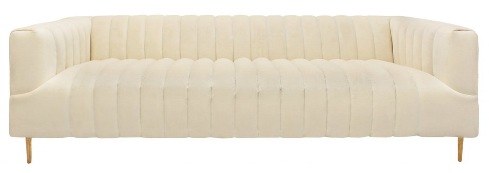 90" Ivory Velvet Sofa And Toss Pillows With Gold Legs in a luxurious design.