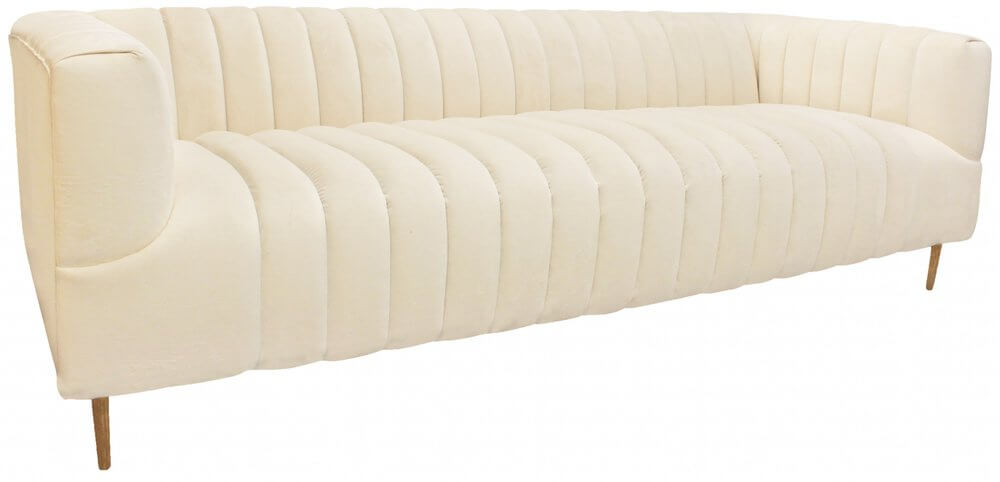 90" Ivory Velvet Sofa And Toss Pillows With Gold Legs featuring soft upholstery and elegant design.