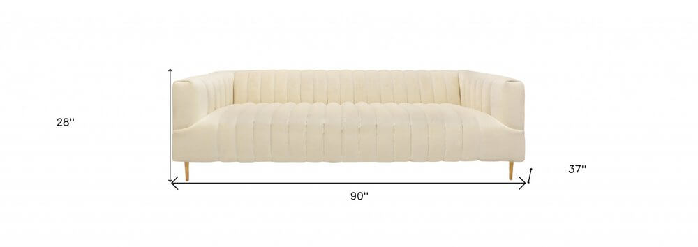 90" Ivory Velvet Sofa And Toss Pillows With Gold Legs dimensions 90x28x37 inches in luxury velvet upholstery.