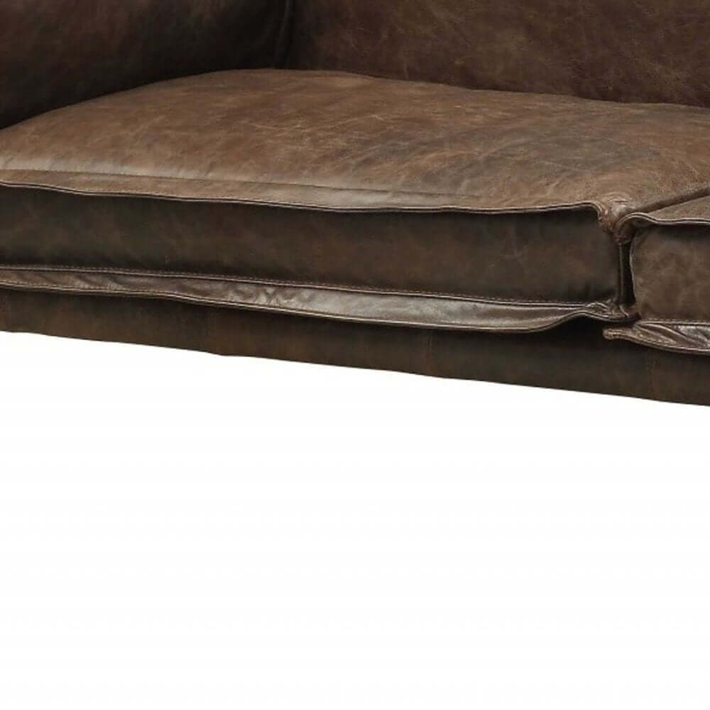 Detail of 94" Chocolate Top Grain Leather Sofa With Dark Brown Legs showcasing supple leather cushions.