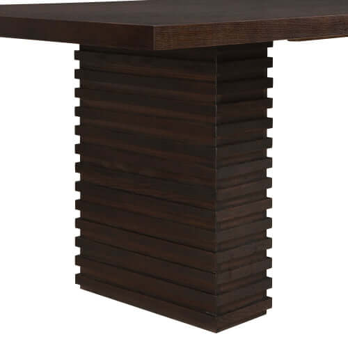 Close-up view of the sculptural double pedestal base of a 95-Inch Modern Walnut Dining Table.