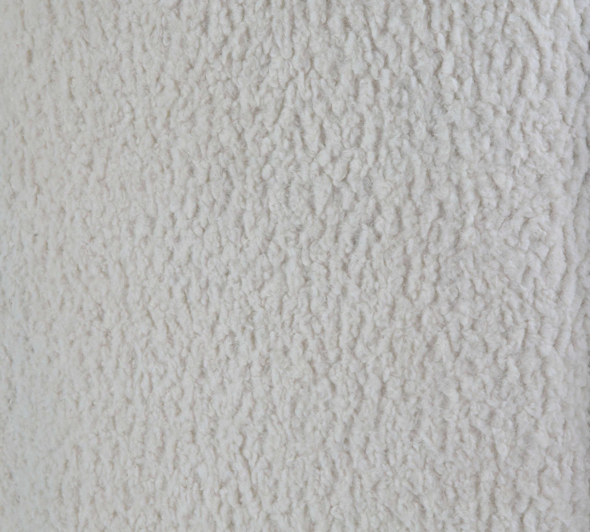 Close-up texture of the White Teddy Sherpa Sofa upholstery showcasing its plush and cozy fabric.