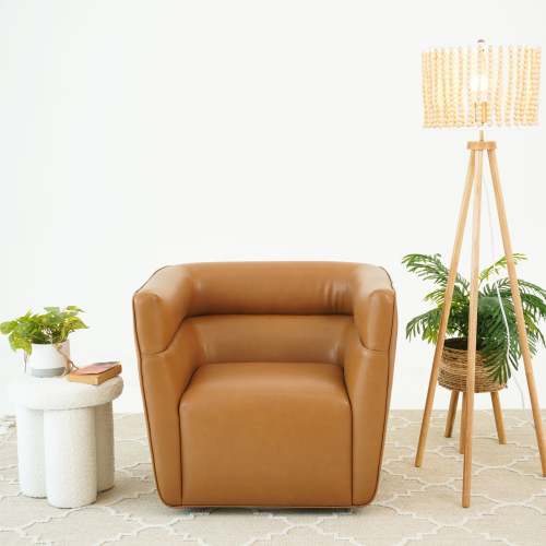 Tan Faux Leather Swivel Chair – Modern Barrel Accent Chair with 360° Swivel (Fully Assembled) in a stylish living room.