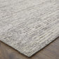 9' X 13' Ivory And Gray Abstract Hand Knotted Distressed Area Rug close-up, showcasing texture and design.