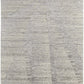 9' X 13' Ivory And Gray Abstract Hand Knotted Distressed Area Rug showcasing its unique design and premium texture.