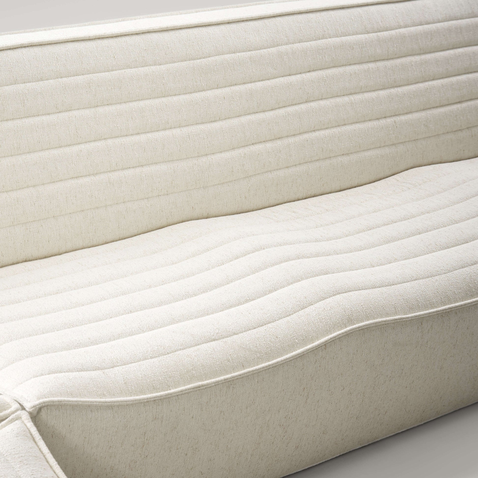 Close-up of the soft, breathable fabric of the Evelyn Harmony Corner Sofa's comfortable backrest.