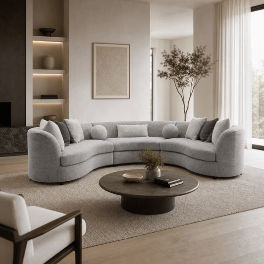 Ivria Gray Bouclé Sectional Sofa – Curved Modular Sofa with 9 Pillows (Modern Statement) in a stylish living room setting.