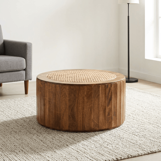 Rivera Solid Mango Wood Rattan Coffee Table – 31.5” Round Artisan Coffee Table (Golden Teak) in a cozy living room setting.