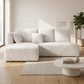 Manya Ivory Corduroy Sectional Sofa – 97” L-Shape Chaise Sofa with Pillows in a modern living room.