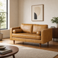 65" Modern Tan Leather Sofa with Solid Wood Legs & Pillow Top Arms