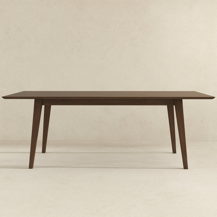 Levi MCM Walnut Dining Table – Rectangular Solid Wood Table (3 Sizes, 2 Colors) in a modern setting.