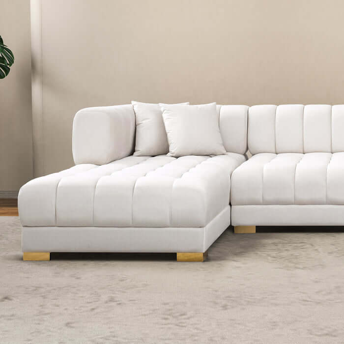 Tufted Velvet Dual Chaise Sectional Sofa 142" – Marlow U-Shaped Velvet Sectional (Ivory or Cognac) in a bright living room.