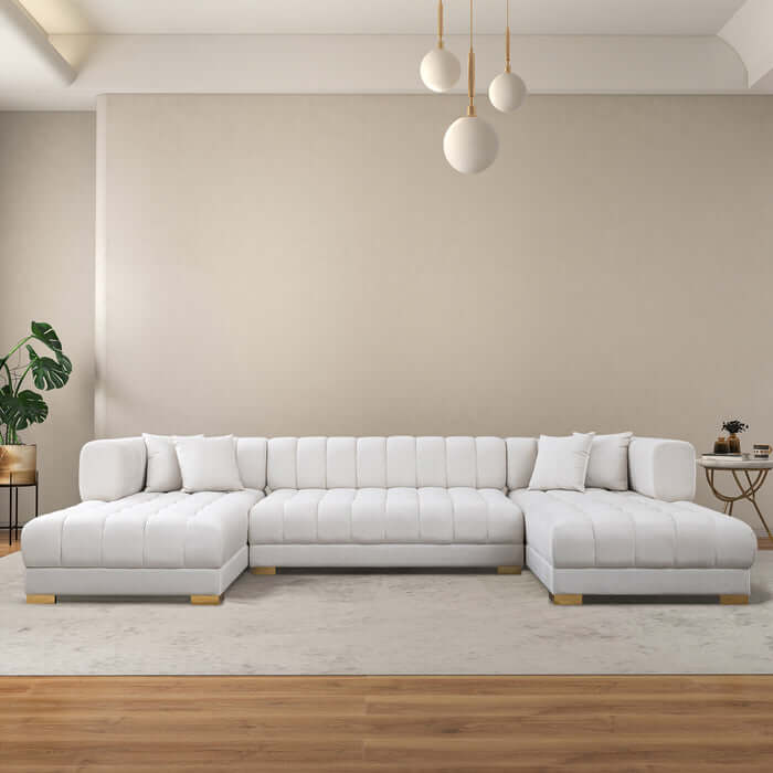 Tufted Velvet Dual Chaise Sectional Sofa 142" – Marlow U-Shaped Velvet Sectional (Ivory or Cognac) in a modern living room.