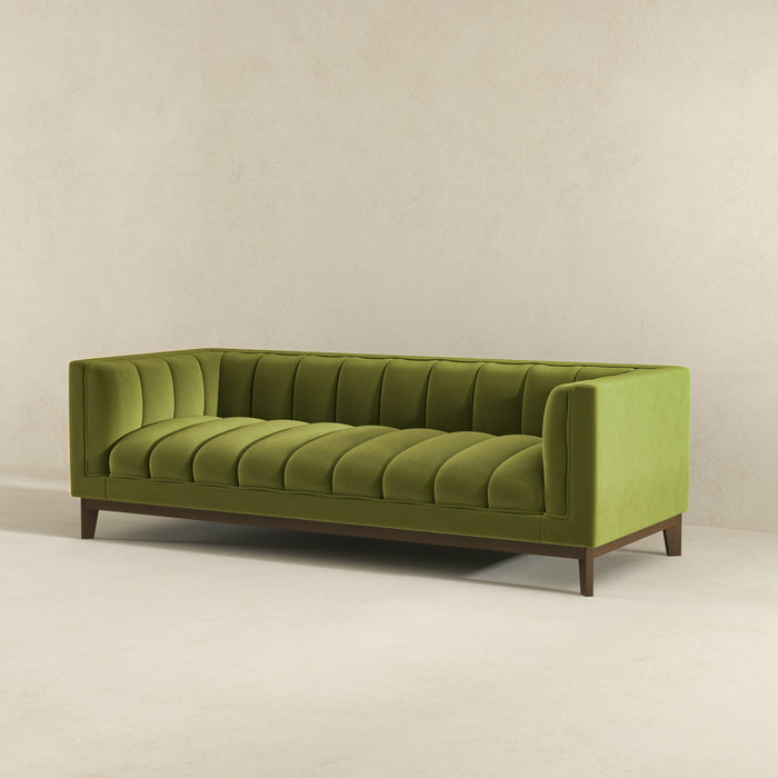 Modern Channel Tufted Fabric Sofa 90” – Melissa MCM Boucle or Velvet Couch (3 Colors) in green velvet upholstery.