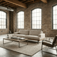 95" Beige Fabric Sofa with Black Legs | Modern Upholstered Living Room Couch in a stylish industrial setting.