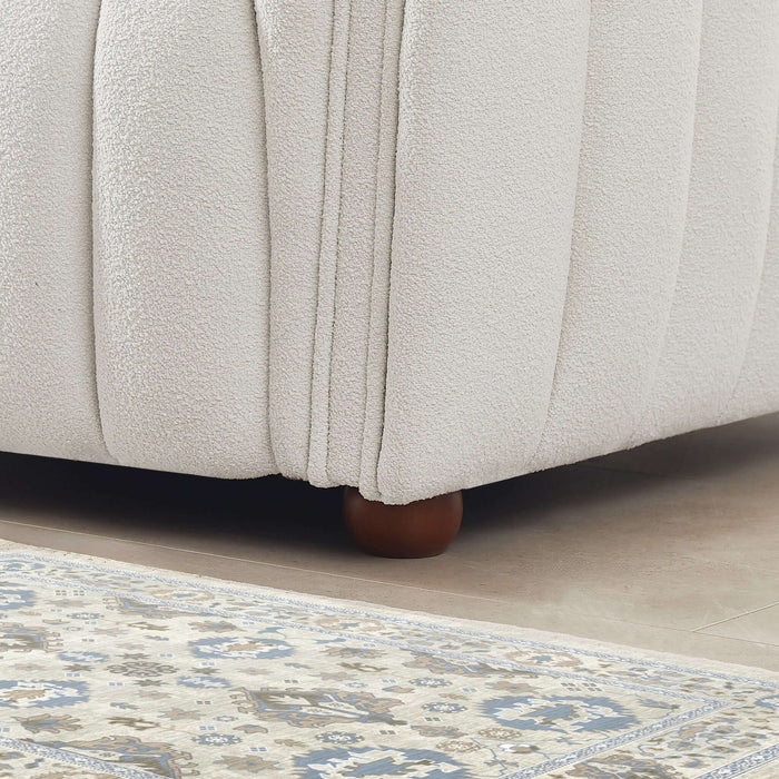 April Channel Tufted Boucle Sofa 86" – Beige Modern Glam Couch base detail with plush boucle fabric and wood legs.