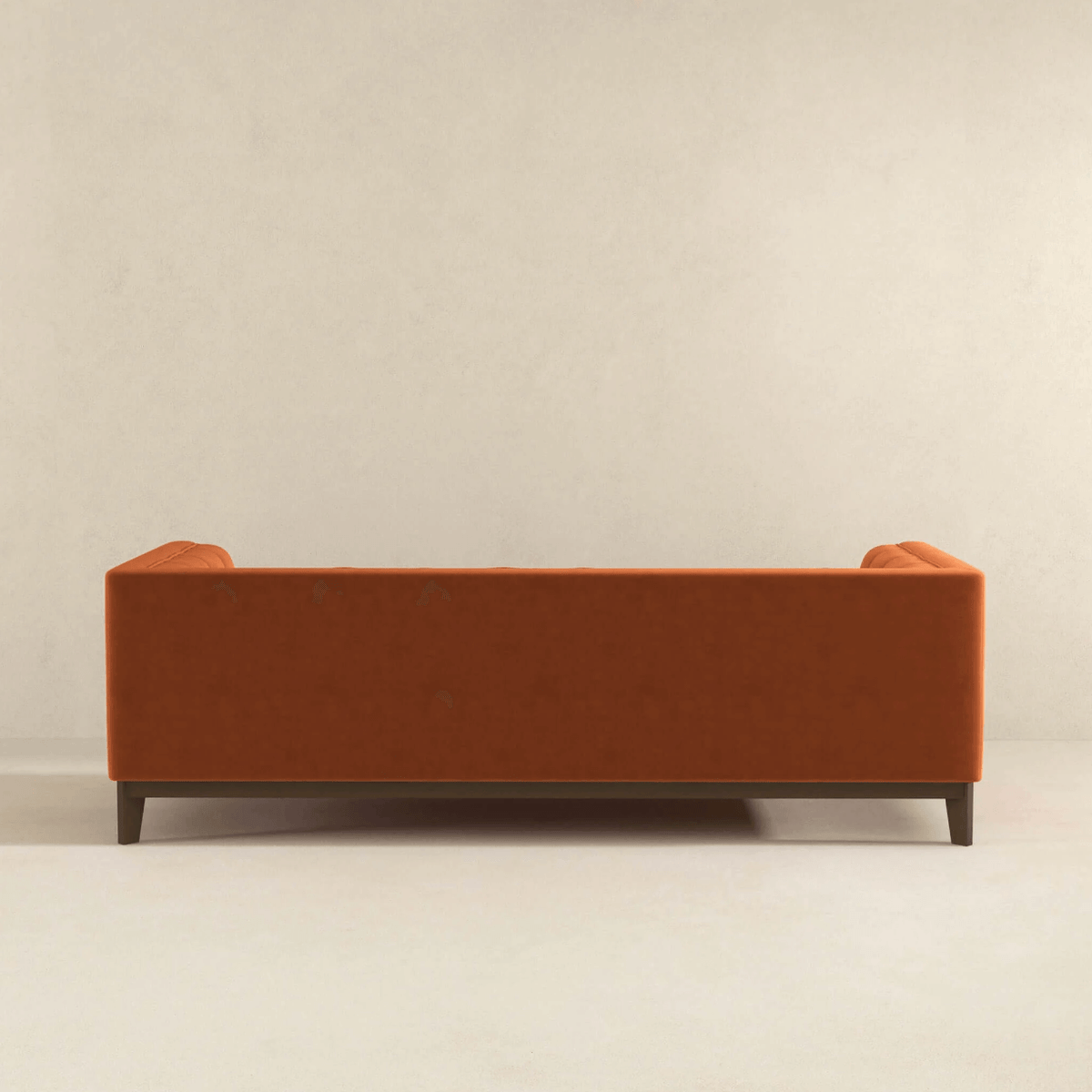 Modern Channel Tufted Fabric Sofa 90” – Melissa MCM Boucle or Velvet Couch (3 Colors) in vibrant orange from back view.
