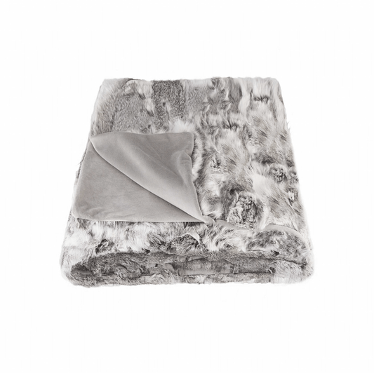 The Home Roots Gray Rabbit Fur Throw Blanket features plush gray and white fur on one side and smooth solid gray fabric on the other, offering a luxurious touch to any space.