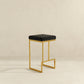 Joel Gold Velvet Bar Stool – Upholstered Backless Counter Stool with Metal Frame (Modern Glam Style) in black and gold.