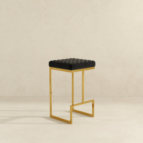 Joel Gold Velvet Bar Stool – Upholstered Backless Counter Stool with Metal Frame (Modern Glam Style) in black and gold.