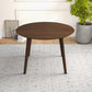 Lara MCM Solid Walnut Round Dining Table 43" – Modern Wood Dining Table in a bright dining area with plants.