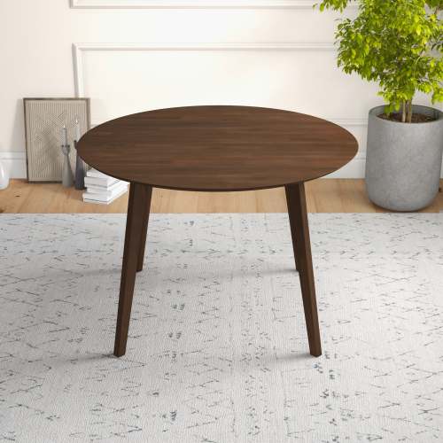 Lara MCM Solid Walnut Round Dining Table 43" – Modern Wood Dining Table in a bright dining area with plants.
