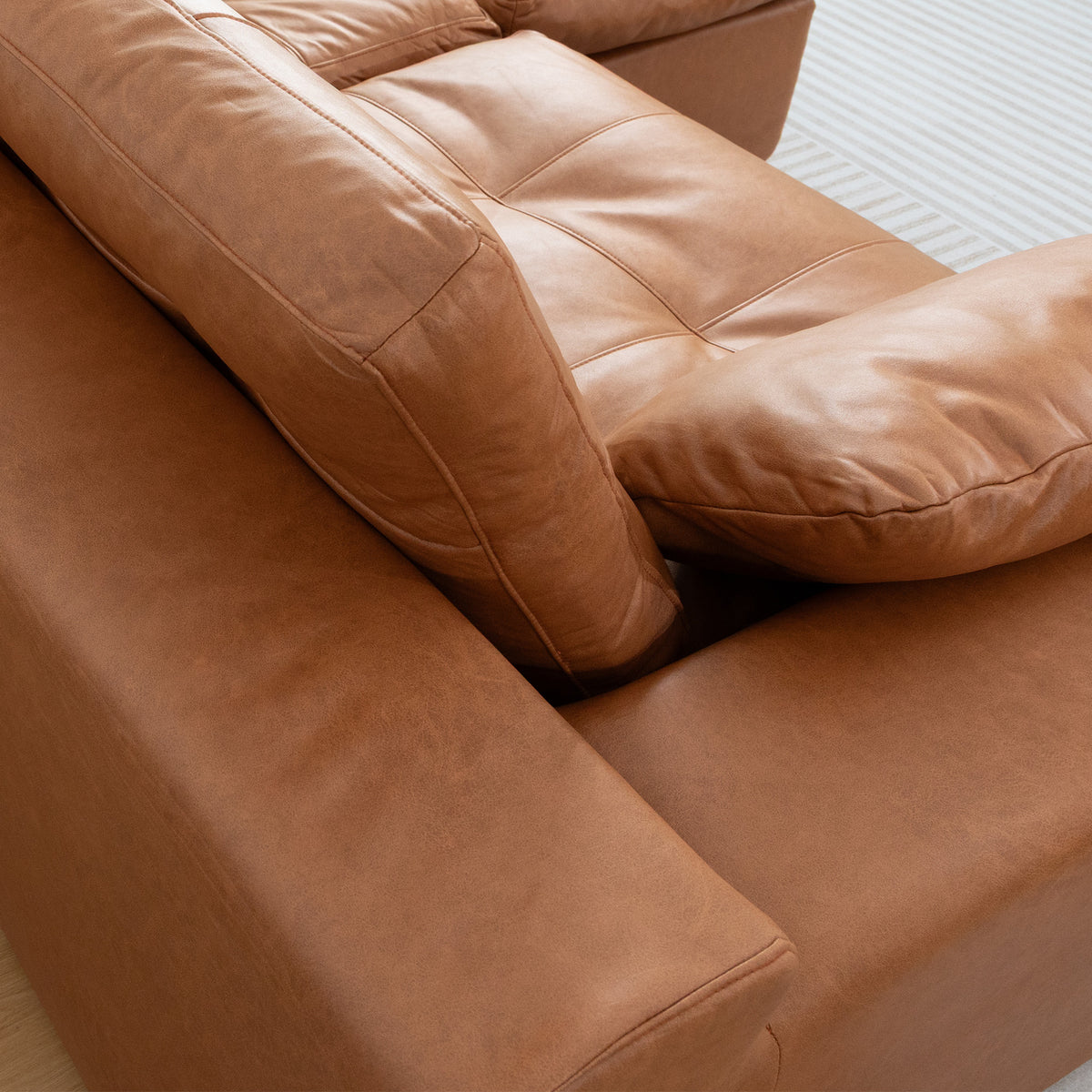 Delano Faux Leather Sectional Sofa
