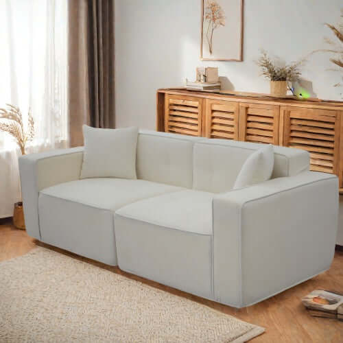Modern low profile box arm memory foam sofa in neutral color, showcasing comfort and contemporary style.