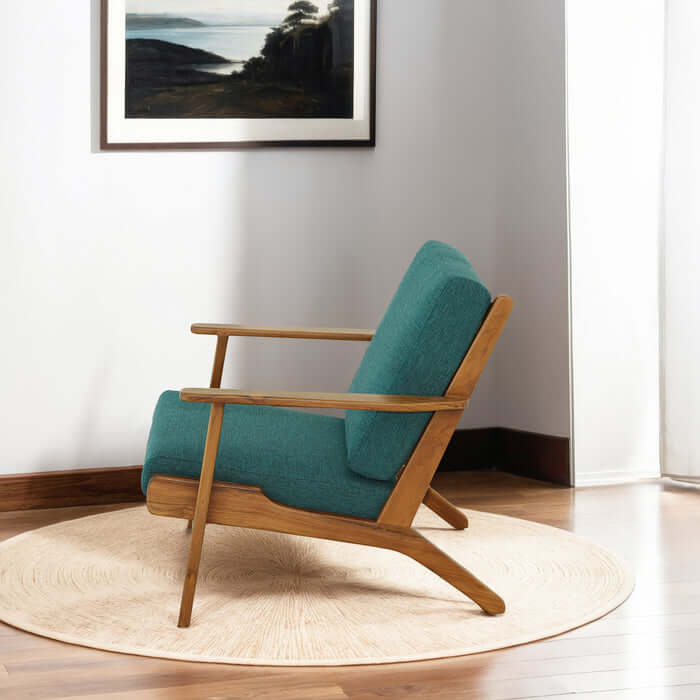 Connor Solid Wood Linen Armchair – Mid-Century Modern Lounge Chair (4 Colors) in teal upholstery, set in a stylish room.