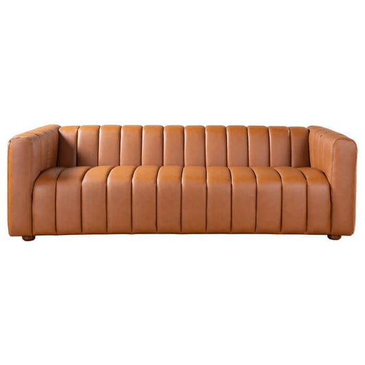 Elrosa Channel Tufted Cognac Faux Leather Sofa with sleek design and channel tufting, perfect for mid-century modern decor.