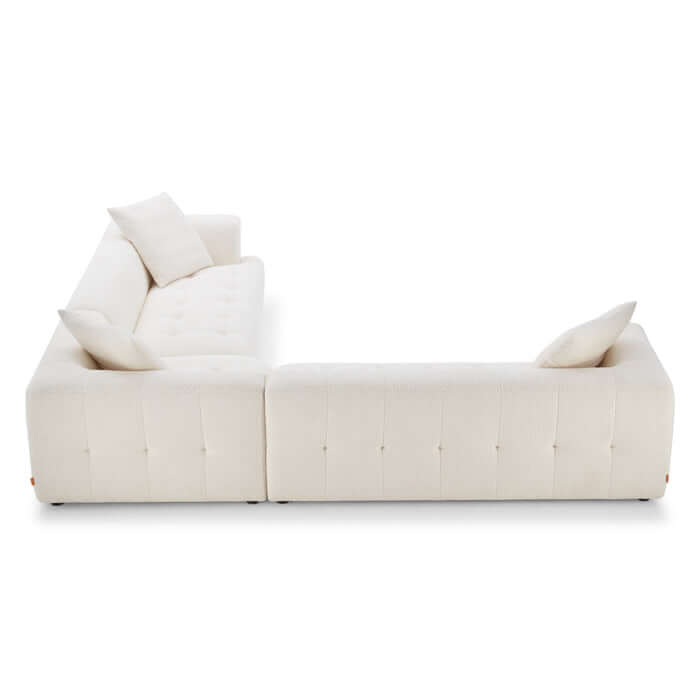 Kaynes L Shape Sectional Sofa in Ivory Boucle with plush upholstery and low-profile design for modern living spaces.