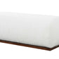 Close-up view of Kelvin Ivory Boucle Ottoman Bench, showcasing soft ivory bouclé upholstery and sturdy wooden frame.