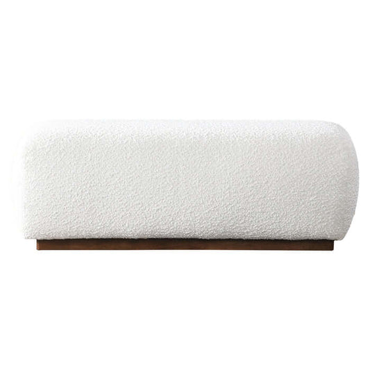 Kelvin Ivory Boucle Ottoman Bench 47” with soft textured upholstery and sturdy wooden frame, embodying modern elegance and minimalism.