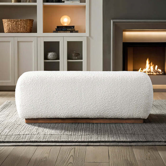 Kelvin Ivory Boucle Ottoman Bench 47” with soft bouclé upholstery in a modern living room setting.