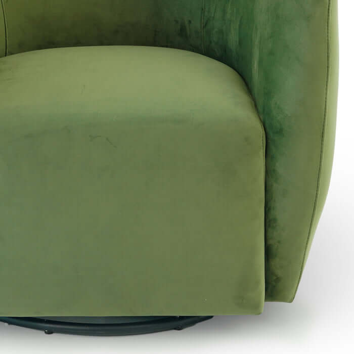 Close-up of the Renee Swivel Lounge Chair in soft green velvet showcasing its elegant barrel design.