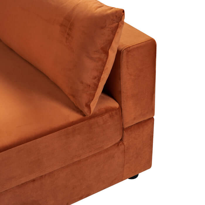 Close-up of the Uptown Burnt Orange Velvet Modular Sofa Sectional showing its luxurious fabric and comfortable cushion.