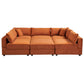 Burnt orange velvet modular sofa sectional with plush cushions, perfect for versatile living room arrangements.