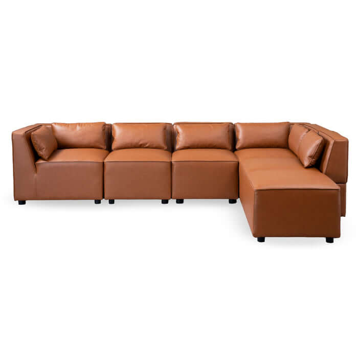 Wexford Cognac PU Leather 5 Pc Modular Sofa Sectional in a modern living room setting. Flexible design with plush cushions.