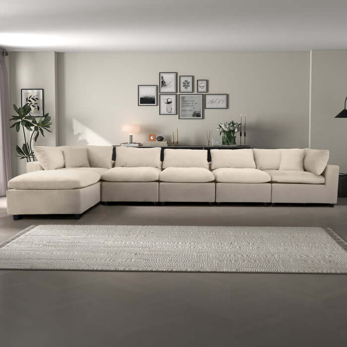 Hayward Velvet Modular Sectional Sofa in cream, designed for luxury and versatility with plush upholstery.