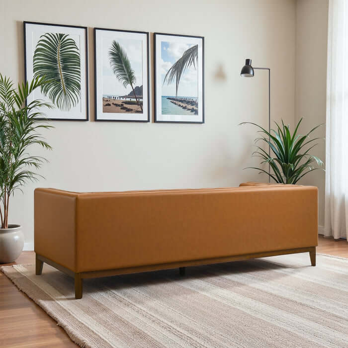 Melissa MCM Vegan Leather Sofa in a stylish living room with mid-century modern decor.