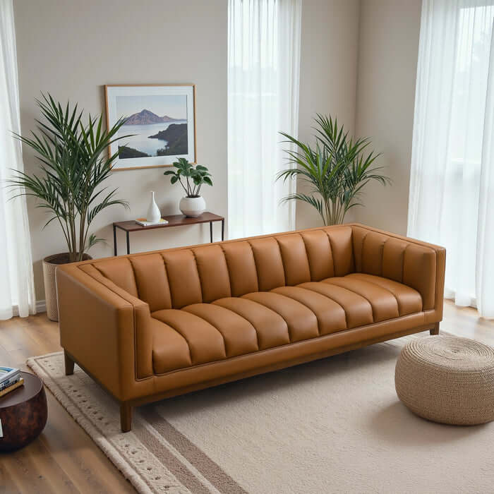 Melissa MCM Vegan Leather Sofa 90" in a stylish living room with plants and natural light.