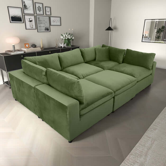 Hayward Velvet Modular Sectional Sofa in green, showcasing plush upholstery and customizable design.