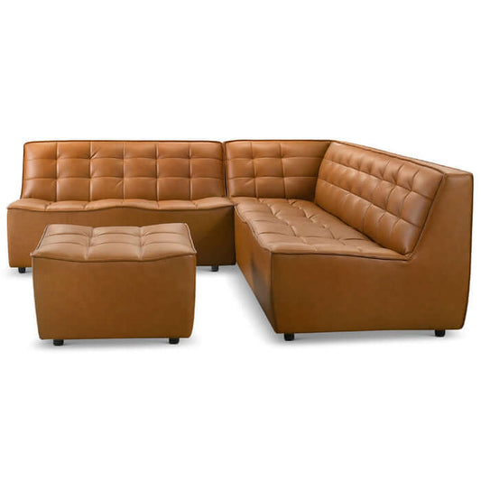 The Ashcroft Furniture Co Selen MCM Leather Modular Corner Sofa Sectional with Ottoman, 91W, showcases a brown tufted design, low backs, and squared edges on a plain white background.