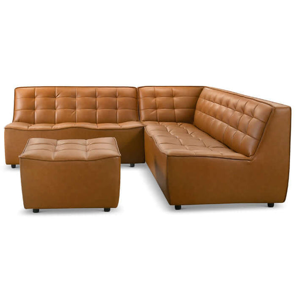 The Ashcroft Furniture Co Selen MCM Leather Modular Corner Sofa Sectional with Ottoman, 91W, showcases a brown tufted design, low backs, and squared edges on a plain white background.