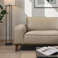 Kerrville beige leather sofa sectional in modern living room, featuring sleek design and cozy comfort.