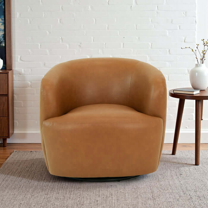 Mina Tan Vegan Leather Swivel Barrel Chair in a modern interior setting, showcasing Italian-inspired design.